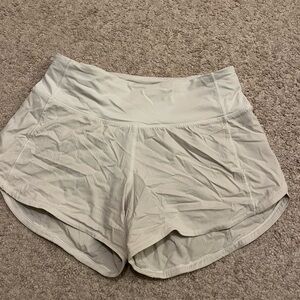 White Lululemon hotty hot shorts 4’